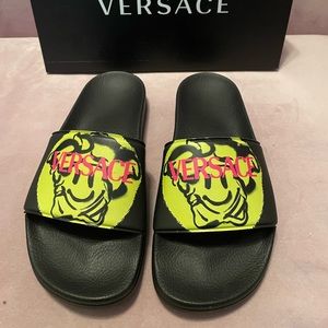 Authentic Brand new never worn Versace slides